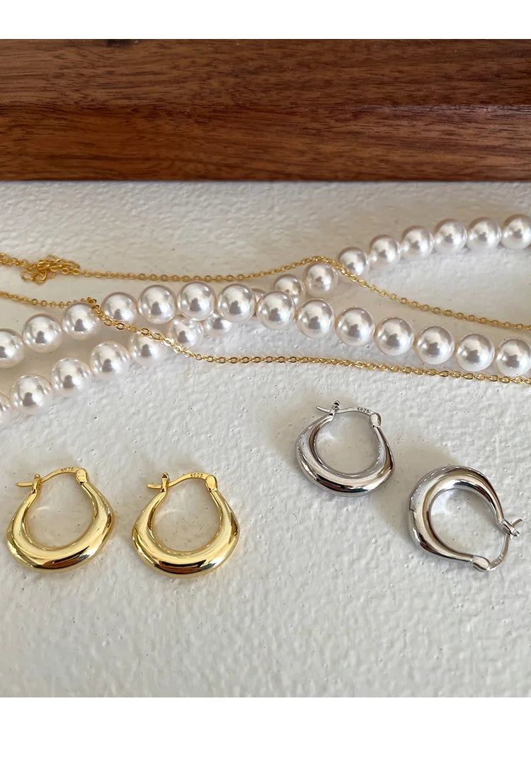 Creolen Sterlingsilber-Ohrringe im leichten Luxus-Stil, einfach, elegant, edel, exquisit und modisch auf höchstem Niveau